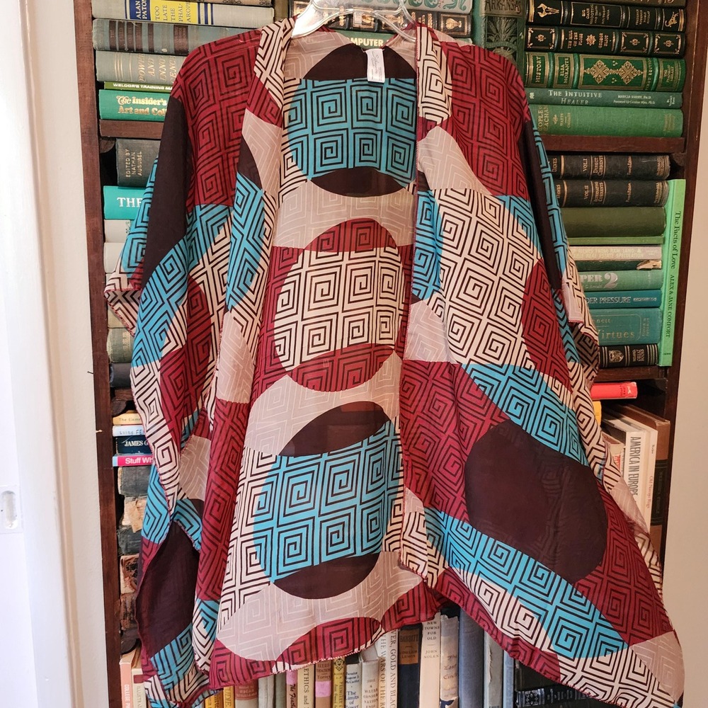 Bold geometric shawl or swimsuit coverup, open front